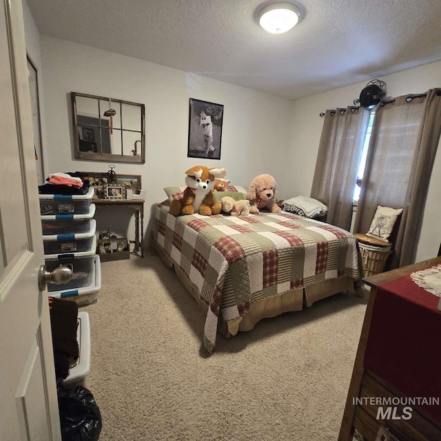 1280 Monroe Creek Rd, Weiser, ID 83672 - carpeted bedroom with a textured ceiling