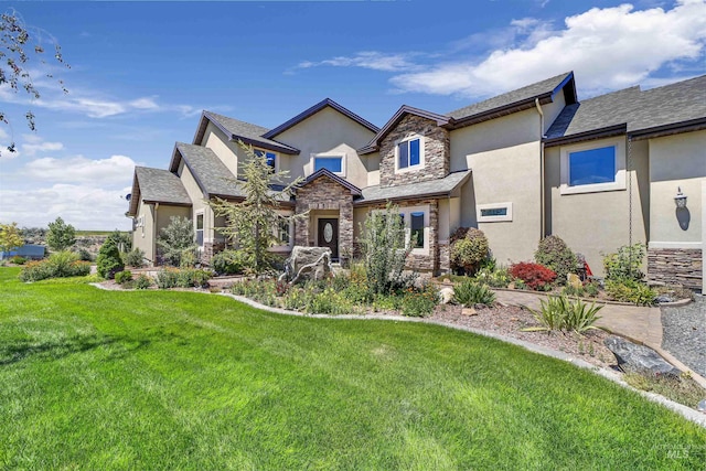 view of front of home with a front lawn