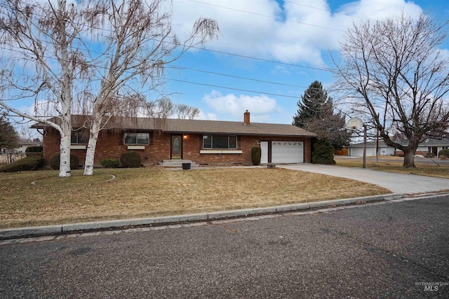 single story home featuring a garage and a front lawn