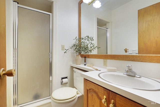 435 W 24th St, Burley, ID 83318 - bathroom with a shower with door, vanity, and toilet