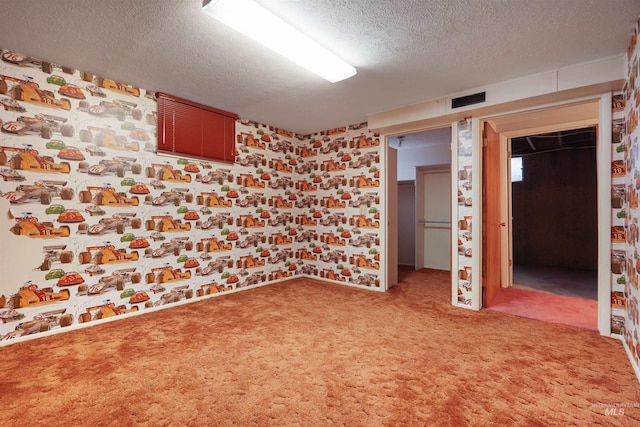 435 W 24th St, Burley, ID 83318 - carpeted empty room with a textured ceiling