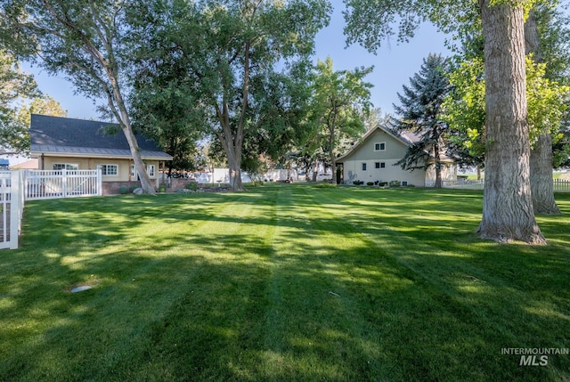 view of yard featuring fence
