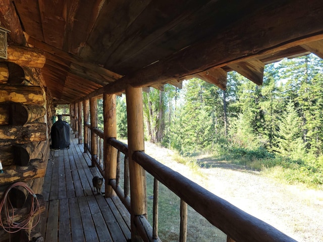 14797 Grangemont Rd, Orofino, ID 83544 - wooden terrace featuring a wooded view