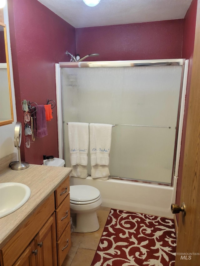 14797 Grangemont Rd, Orofino, ID 83544 - full bath with bath / shower combo with glass door, vanity, and toilet