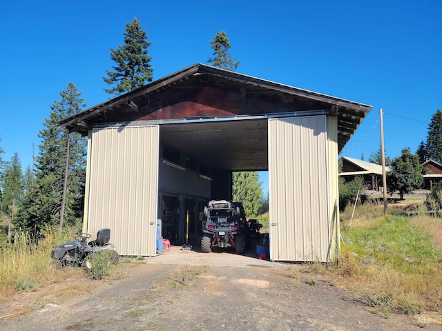 14797 Grangemont Rd, Orofino, ID 83544 - view of outdoor structure featuring driveway and an outdoor structure