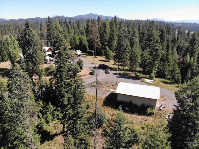 14797 Grangemont Rd, Orofino, ID 83544 - view of subject property featuring a heavily wooded area and a mountain backdrop