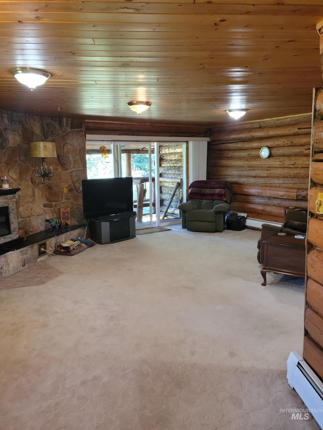 14797 Grangemont Rd, Orofino, ID 83544 - living area featuring wooden ceiling, log walls, a baseboard heating unit, a fireplace, and carpet