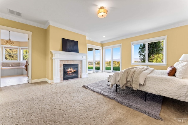 6990 S Skybreak Ln, Meridian, ID 83642 - bedroom featuring access to exterior, ornamental molding, carpet flooring, and a glass covered fireplace