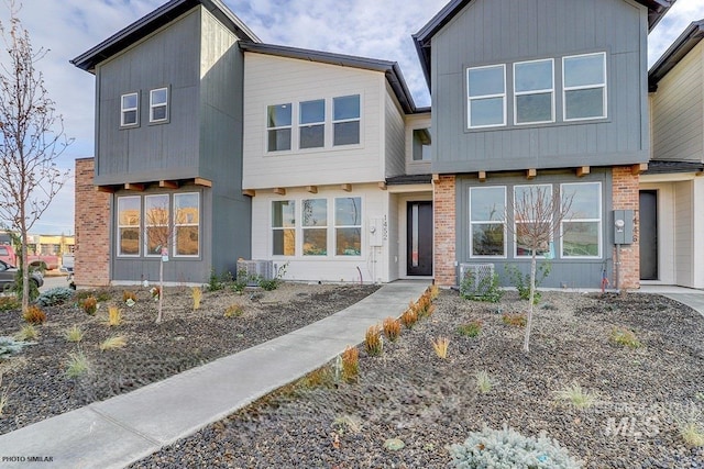 1327 N Webb Way, Meridian, ID 83642 - contemporary house with brick siding