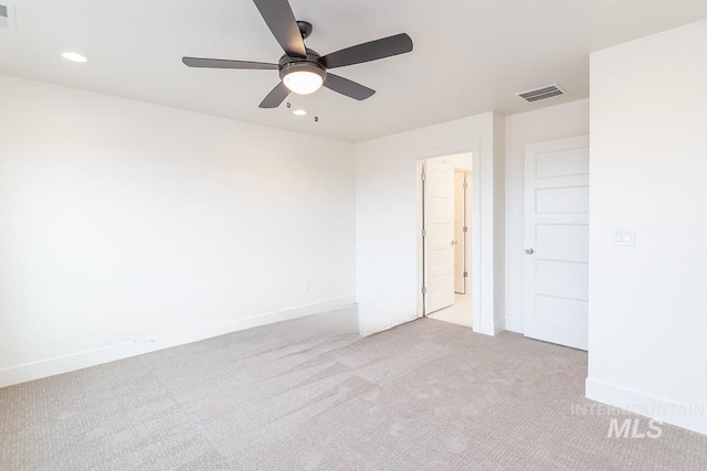 1327 N Webb Way, Meridian, ID 83642 - unfurnished room with light colored carpet, ceiling fan, baseboards, and recessed lighting