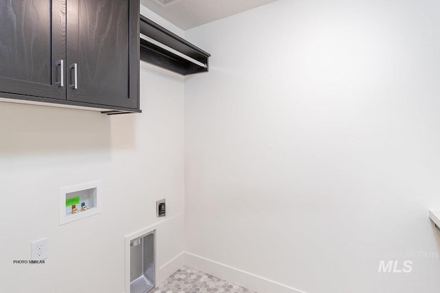 1327 N Webb Way, Meridian, ID 83642 - laundry area featuring washer hookup, cabinet space, baseboards, and hookup for an electric dryer
