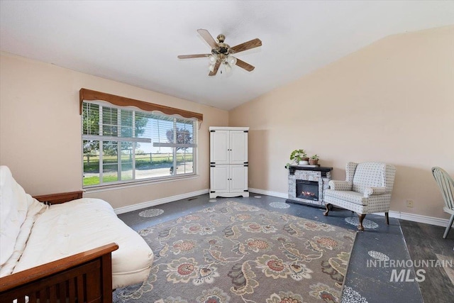 2123 E 3970 N, Filer, ID 83328 - sitting room with lofted ceiling, ceiling fan, baseboards, and a fireplace