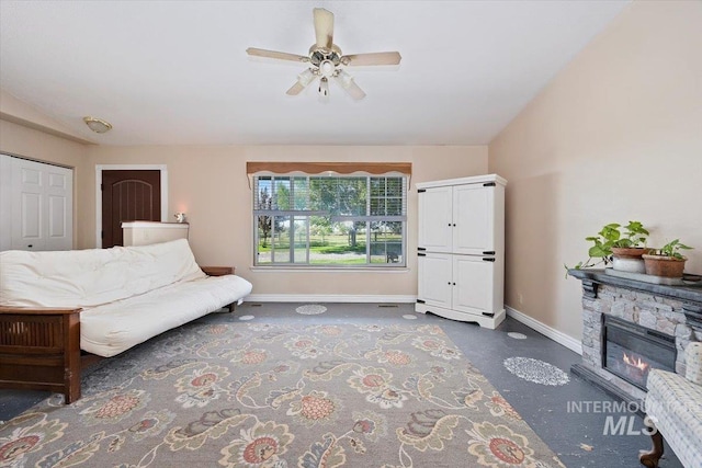 2123 E 3970 N, Filer, ID 83328 - living area featuring baseboards, ceiling fan, vaulted ceiling, and a stone fireplace