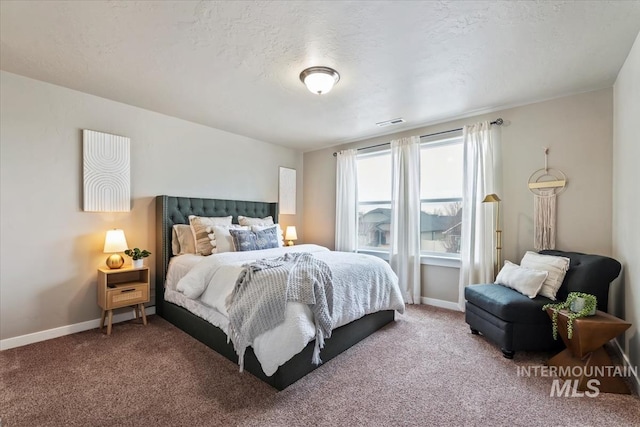 bedroom featuring carpet, visible vents, and baseboards