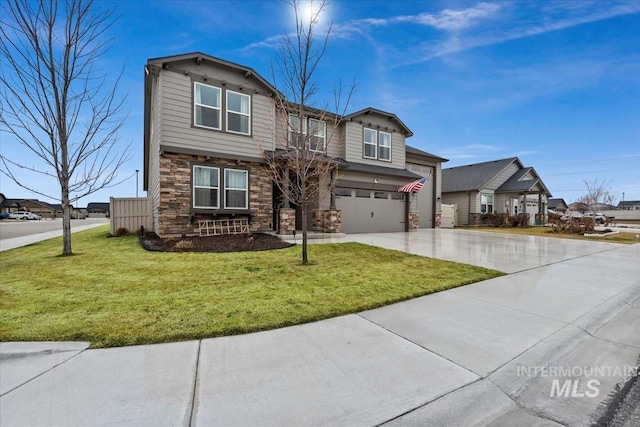 view of front of house featuring an attached garage, stone siding, a front lawn, and concrete driveway