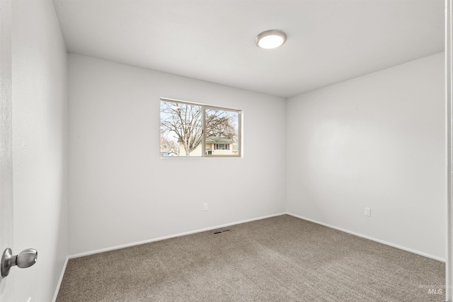 view of carpeted spare room