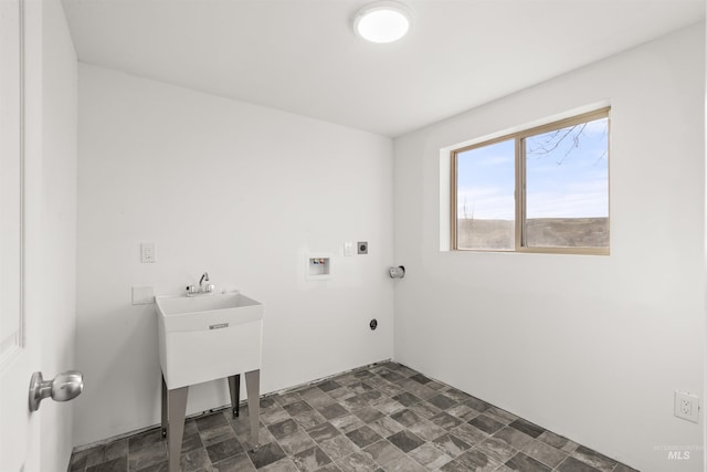 laundry room featuring electric dryer hookup and washer hookup