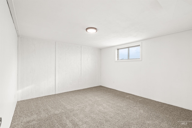 basement featuring carpet flooring