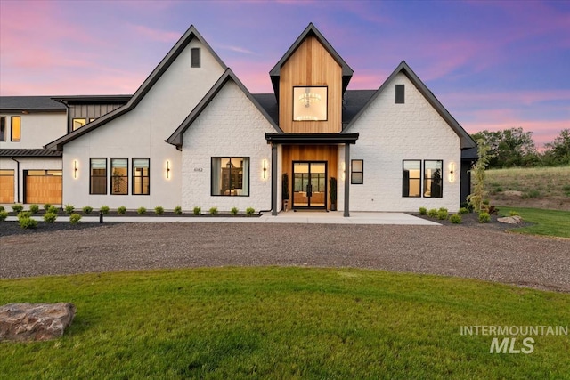6162 N High Valley Way, Boise, ID 83714 - view of front of property featuring a yard and board and batten siding