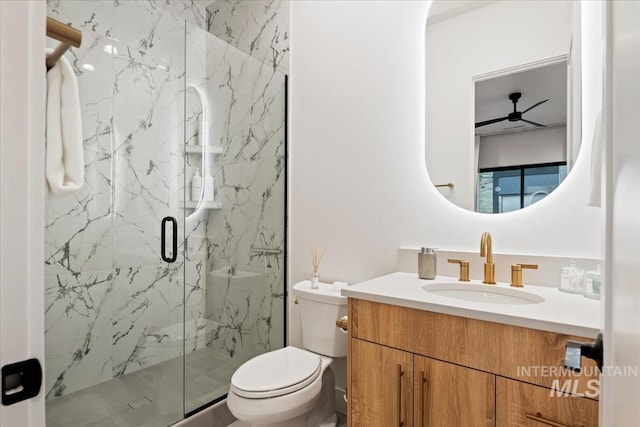 6162 N High Valley Way, Boise, ID 83714 - full bathroom with a marble finish shower, toilet, vanity, and a ceiling fan
