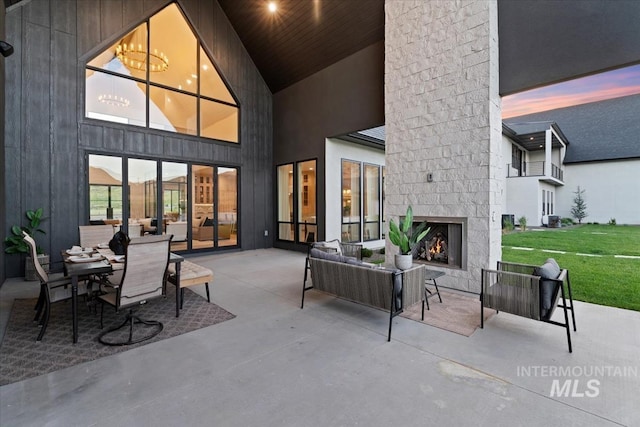 6162 N High Valley Way, Boise, ID 83714 - view of patio / terrace with an outdoor living space with a fireplace
