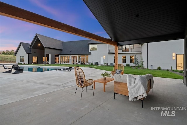 6162 N High Valley Way, Boise, ID 83714 - patio terrace at dusk with a patio area and an outdoor pool