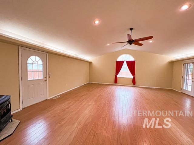 bedroom with ceiling fan and light colored carpet