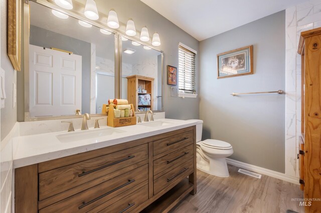 carpeted home office featuring ceiling fan