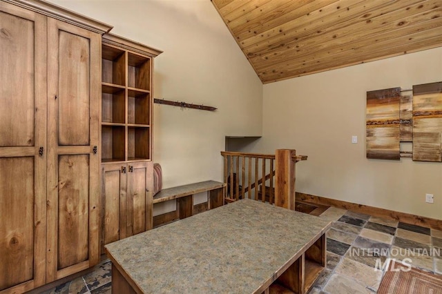 516 Whitewater Dr, Donnelly, ID 83615 - tiled dining space with vaulted ceiling and wooden ceiling
