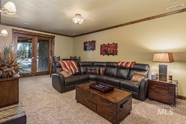 516 Whitewater Dr, Donnelly, ID 83615 - carpeted living room featuring a textured ceiling and ornamental molding