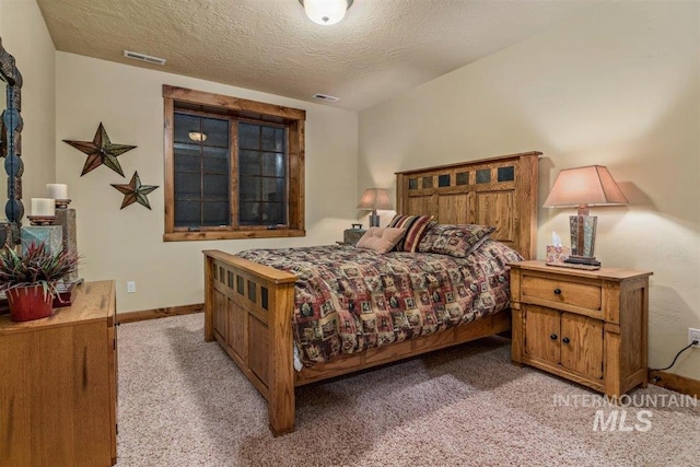 516 Whitewater Dr, Donnelly, ID 83615 - bedroom with carpet flooring and a textured ceiling