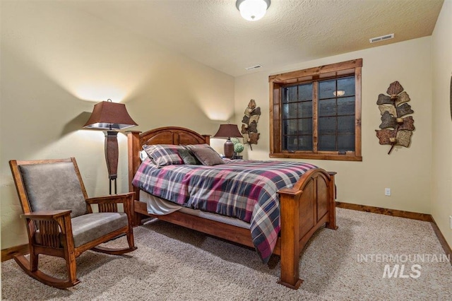 516 Whitewater Dr, Donnelly, ID 83615 - carpeted bedroom with a textured ceiling