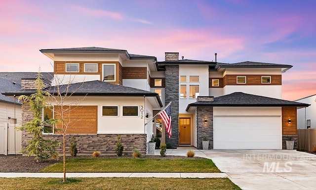 3012 E Parulo Dr, Meridian, ID 83642 - view of front of house featuring a chimney, fence, stucco siding, driveway, and stone siding