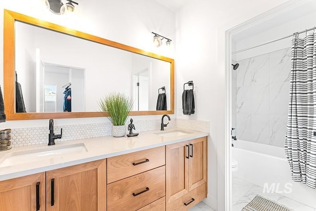 3012 E Parulo Dr, Meridian, ID 83642 - full bath featuring marble finish floor, a sink, double vanity, and shower / bathtub combination with curtain