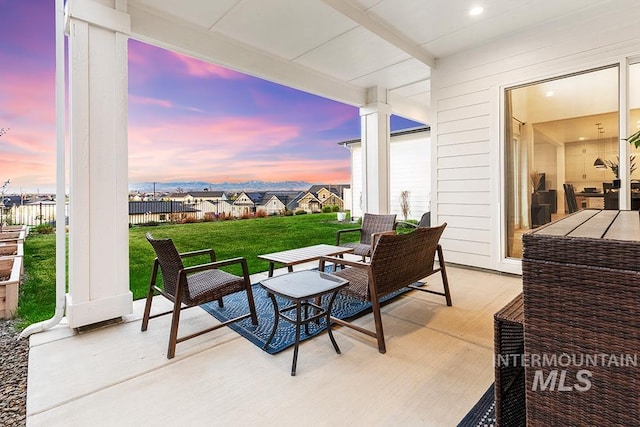 3012 E Parulo Dr, Meridian, ID 83642 - patio terrace at dusk featuring a yard