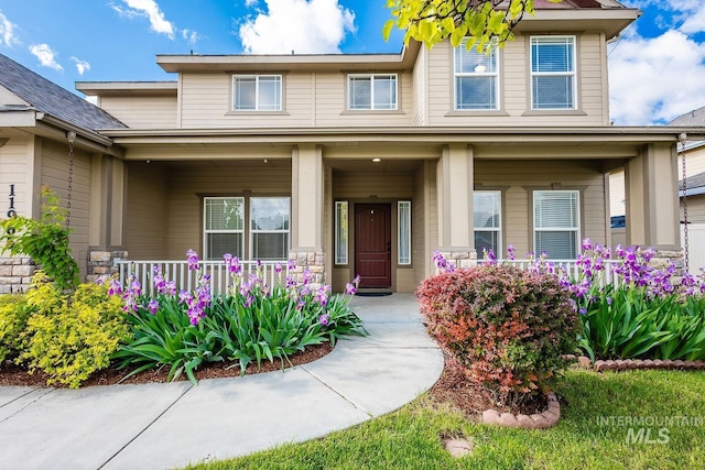 11965 Goldfinch St, Caldwell, ID 83605 - doorway to property featuring covered porch