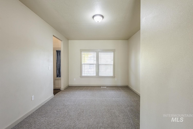 11965 Goldfinch St, Caldwell, ID 83605 - unfurnished room with carpet and baseboards