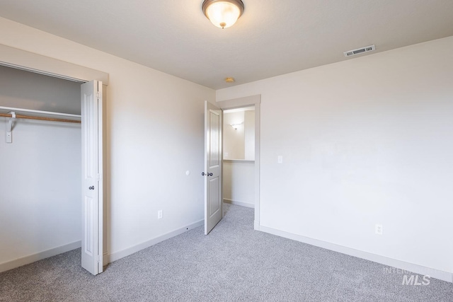 11965 Goldfinch St, Caldwell, ID 83605 - unfurnished bedroom with carpet floors, baseboards, and a closet