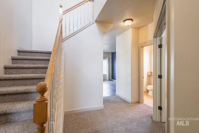 11965 Goldfinch St, Caldwell, ID 83605 - stairs featuring carpet floors and baseboards