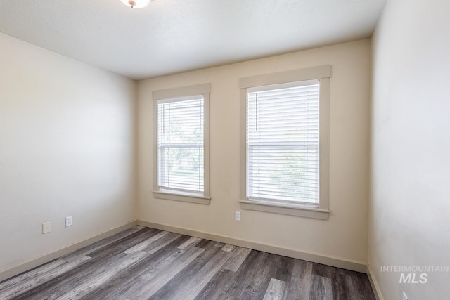 11965 Goldfinch St, Caldwell, ID 83605 - unfurnished room featuring wood finished floors and baseboards
