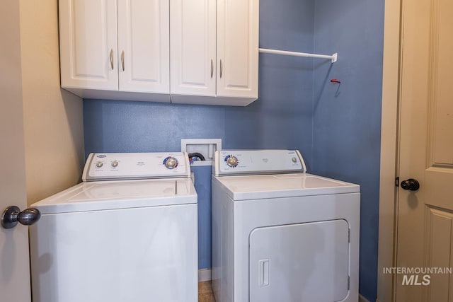 11965 Goldfinch St, Caldwell, ID 83605 - laundry area featuring separate washer and dryer and cabinet space