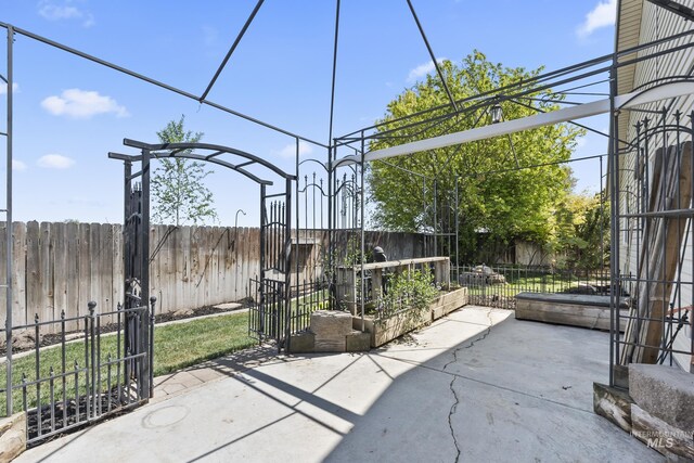 view of patio with a fenced backyard