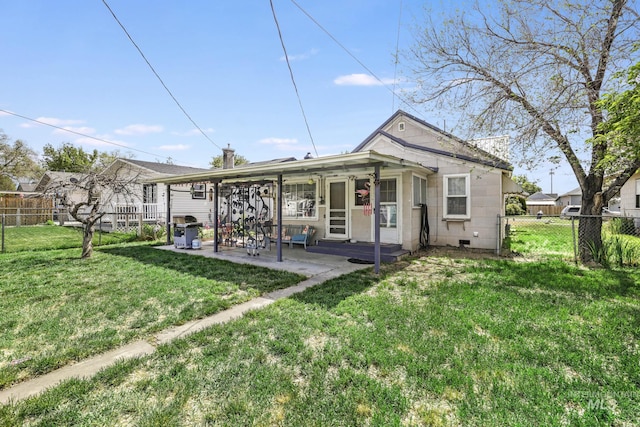 411 E 6th Ave, Twin Falls, ID 83301 - rear view of house with a patio area
