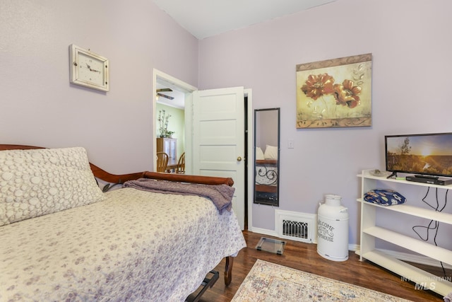 411 E 6th Ave, Twin Falls, ID 83301 - bedroom featuring wood finished floors and baseboards