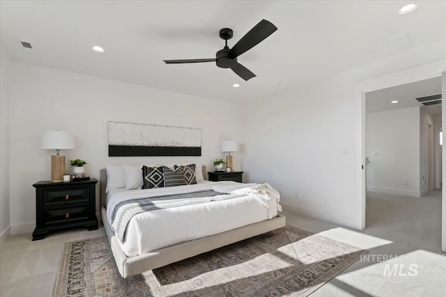 carpeted bedroom with ceiling fan