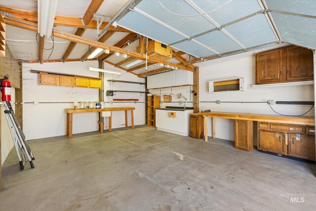4667 S Shawnee Way, Boise, ID 83709 - garage featuring a workshop area
