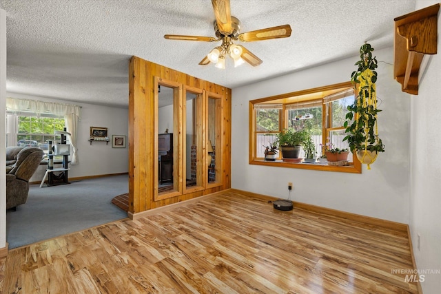 4667 S Shawnee Way, Boise, ID 83709 - spare room with wood finished floors, a textured ceiling, and ceiling fan