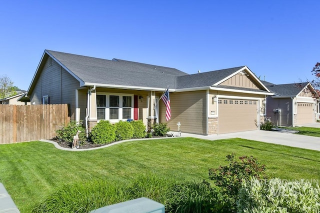view of front of property featuring a garage, driveway, board and batten siding, and stone siding