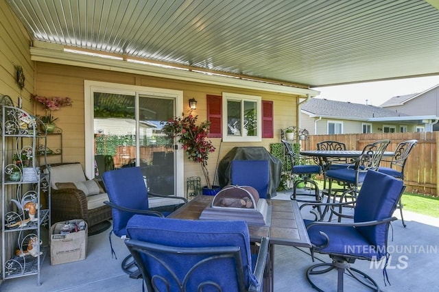 view of patio / terrace with fence and outdoor dining space
