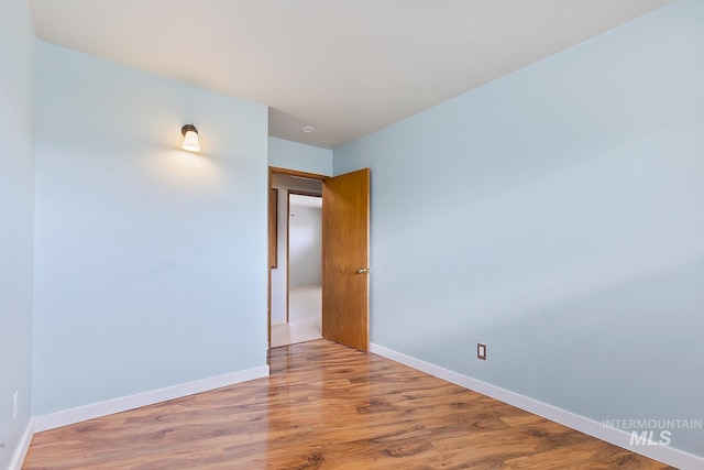 1015 24th St, Lewiston, ID 83501 - empty room with light wood finished floors and baseboards